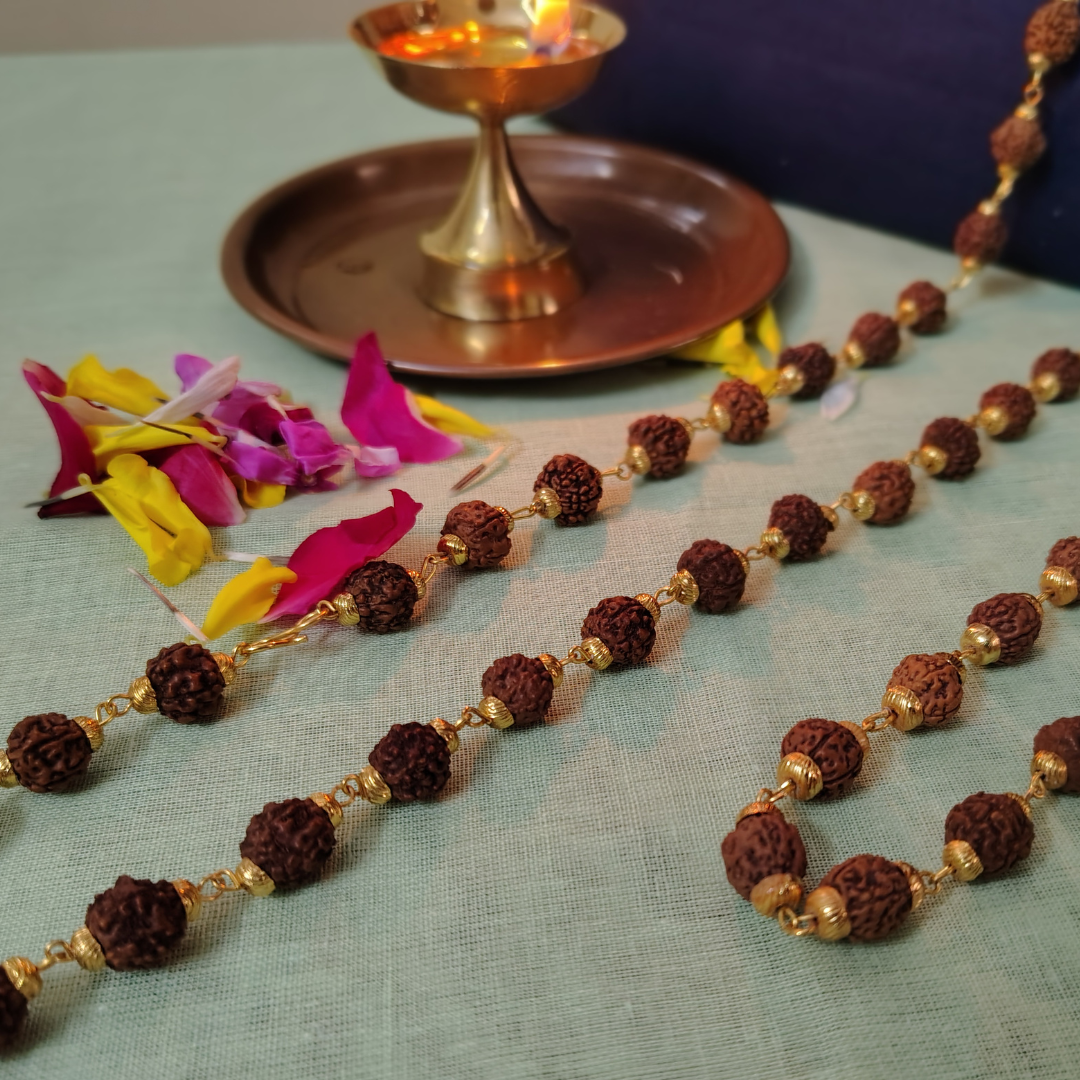 Gold finish mala + bracelet